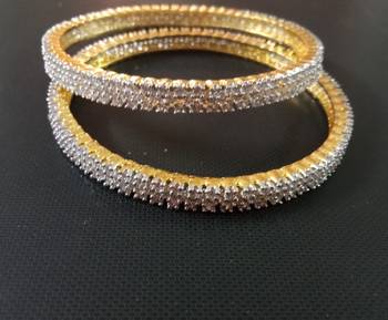 Gold cubic zirconia bangles-and-bracelets 1