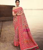 Beige woven banarasi silk saree with blouse