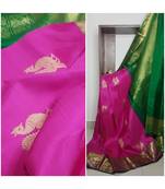 Pink handloom art  pure silk saree with contrasting green blouse.