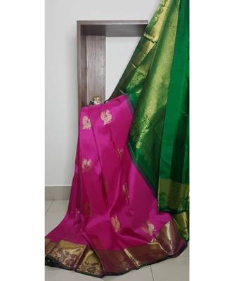Pink handloom art  pure silk saree with contrasting green blouse. 2