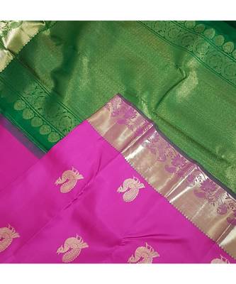 Pink handloom art  pure silk saree with contrasting green blouse. 3