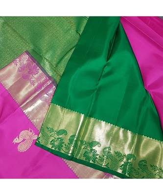 Pink handloom art  pure silk saree with contrasting green blouse. 4