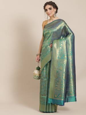 Green woven silk saree with blouse 1