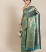 Green woven silk saree with blouse