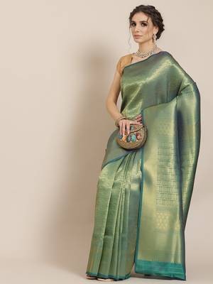 Green woven silk saree with blouse 1