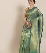 Green woven silk saree with blouse