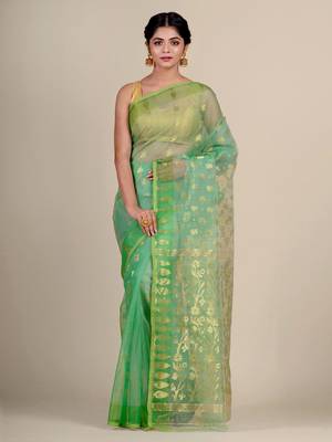 Green hand woven silk saree with blouse 1