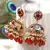 Red pearl jhumkas