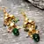 Green pearl earrings