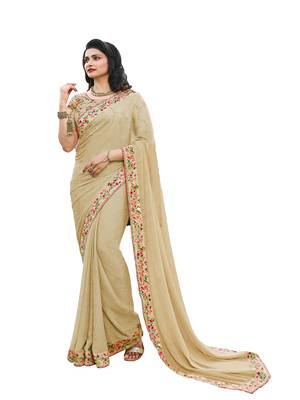 Beige printed georgette saree with blouse 1