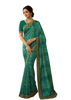 Green printed georgette saree with blouse 1