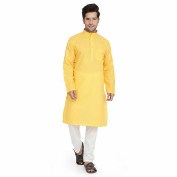 Yellow cotton plain stitched   kurta &    pyjama 1