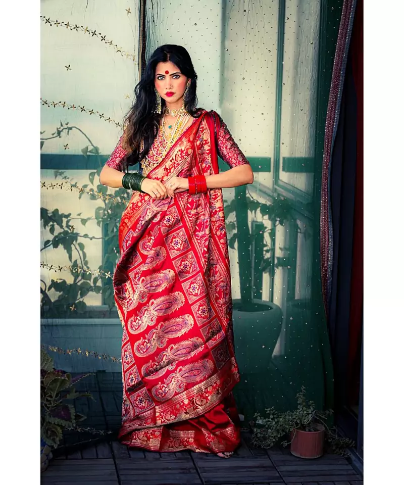 Red all over Baluchari with meenakari perfect for the festivities