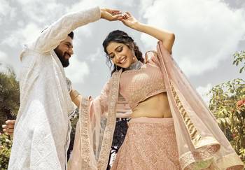 Mesmerizing Peach dori, zari, and resham embroidered organza Semi Stitched wedding Lehenga 3
