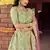 Delightful Green Spring sequins, zarkan, and resham embroidered raw silk semi stitched wedding lehenga