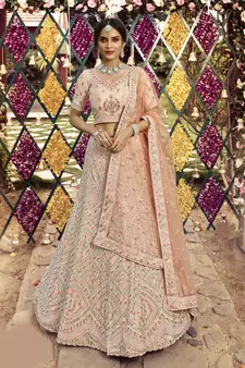 Fetching Almond Peach swarovski, zarkan, zari, and resham embroidered crepe semi stitched wedding lehenga
