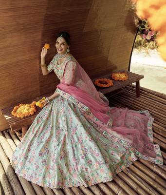 glamourous Green sequins, swarovski, zarkan, and resham embroidered satin semi stitched wedding lehenga 3