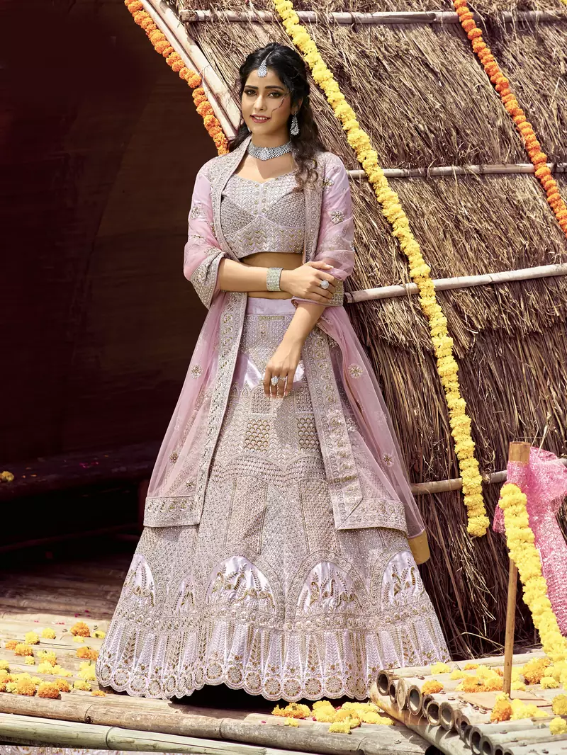 Glamorous Pink zarkan, zari, and dori embroidered velvet semi stitched wedding lehenga
