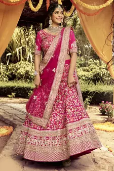 Colorful Pink beads, zari, and resham embroidered raw silk semi stitched wedding lehenga