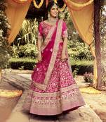 Colorful Pink beads, zari, and resham embroidered raw Silk Semi Stitched wedding Lehenga