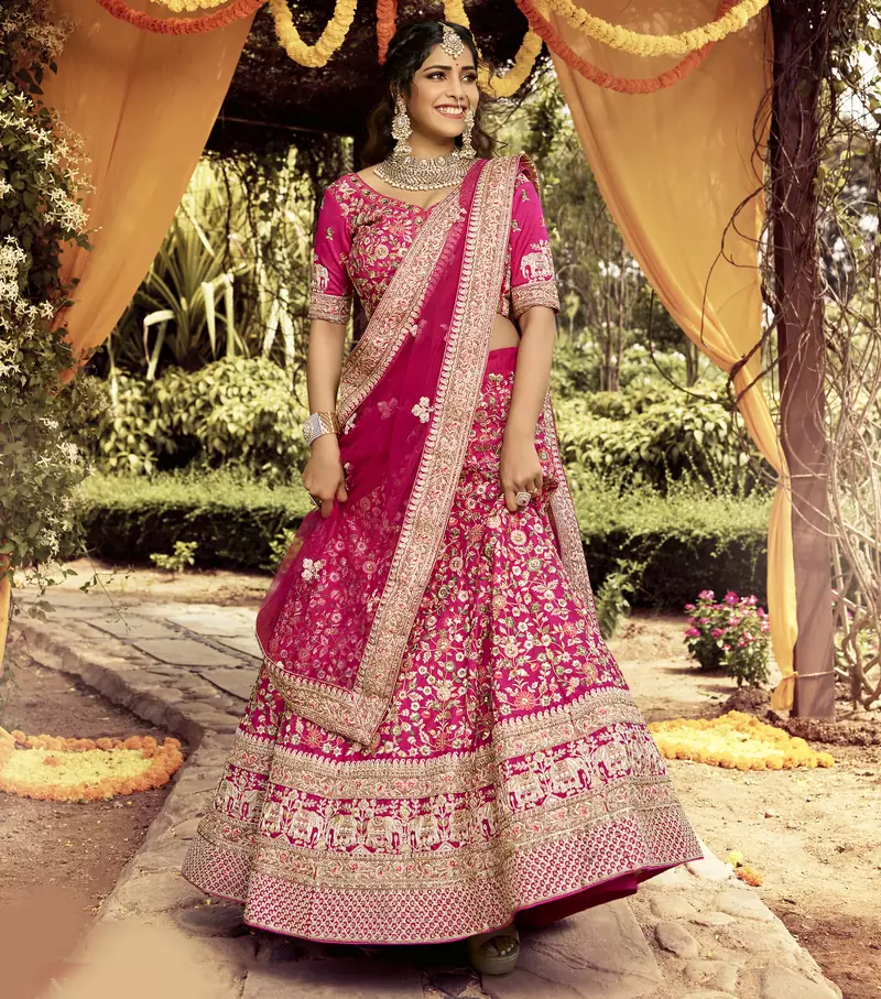 Colorful Pink beads, zari, and resham embroidered raw silk semi stitched wedding lehenga