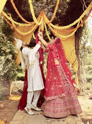 Comely Red dori, zarkan, and resham embroidered raw Silk Semi Stitched wedding Lehenga 4