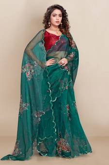 green Organza saree with blouse piece