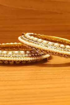 White bangles-and-bracelets