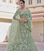 Green embroidered net semi stitched lehenga