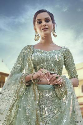 Green embroidered net semi stitched lehenga 2