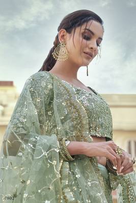 Green embroidered net semi stitched lehenga 3