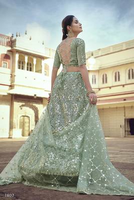 Green embroidered net semi stitched lehenga 4
