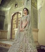 Green embroidered net semi stitched lehenga