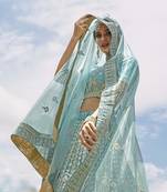 Turquoise embroidered organza semi stitched lehenga