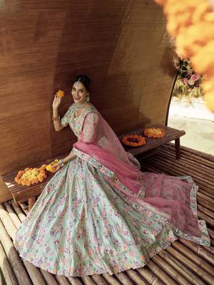 Green embroidered satin semi stitched lehenga 4