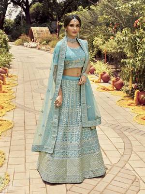 Turquoise embroidered organza semi stitched lehenga 2