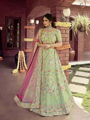 Green embroidered silk semi stitched lehenga 1