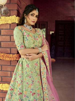 Green embroidered silk semi stitched lehenga 3