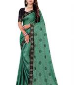 Green heavy teri jacquard  silk  sari with teri Jacquard silk blouse with fancy lace.