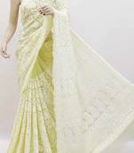 Yellow embroidered georgette saree with blouse