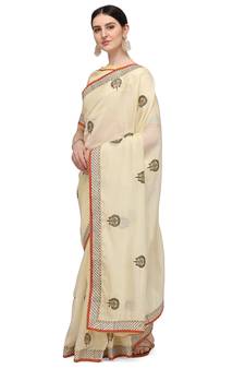 Light yellow embroidered organza saree with blouse