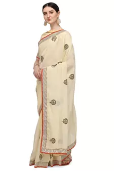 Light yellow embroidered organza saree with blouse