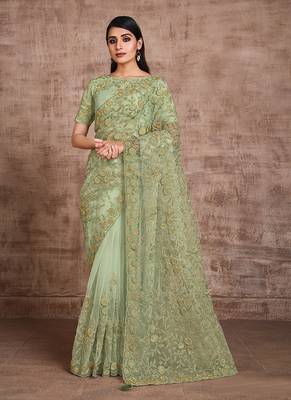 Dark green embroidered net saree with blouse 1