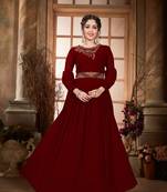 Saahmriga Maroon Color Embroidered Faux Georgette Semi Stitched Gown
