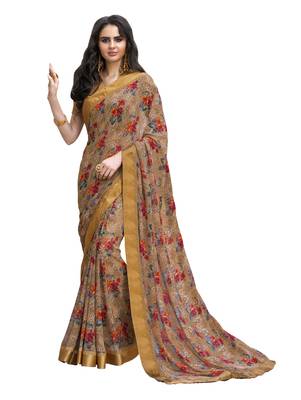 Beige printed georgette saree with blouse 1