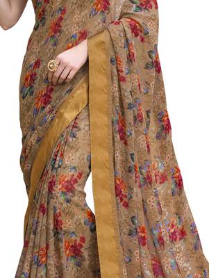 Beige printed georgette saree with blouse 4