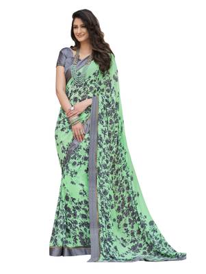 Light green printed georgette saree with blouse 1