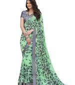 Light green printed georgette saree with blouse