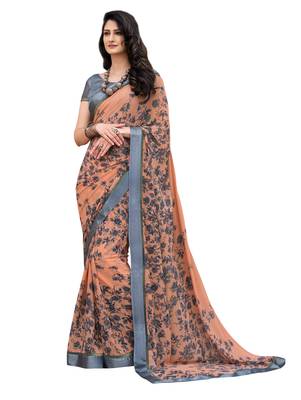 Orange printed georgette saree with blouse 1