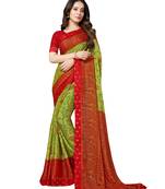 Green printed chiffon saree with blouse